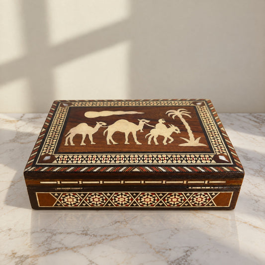 Caravanserai Mosaic Box on a white marble table in warm window light