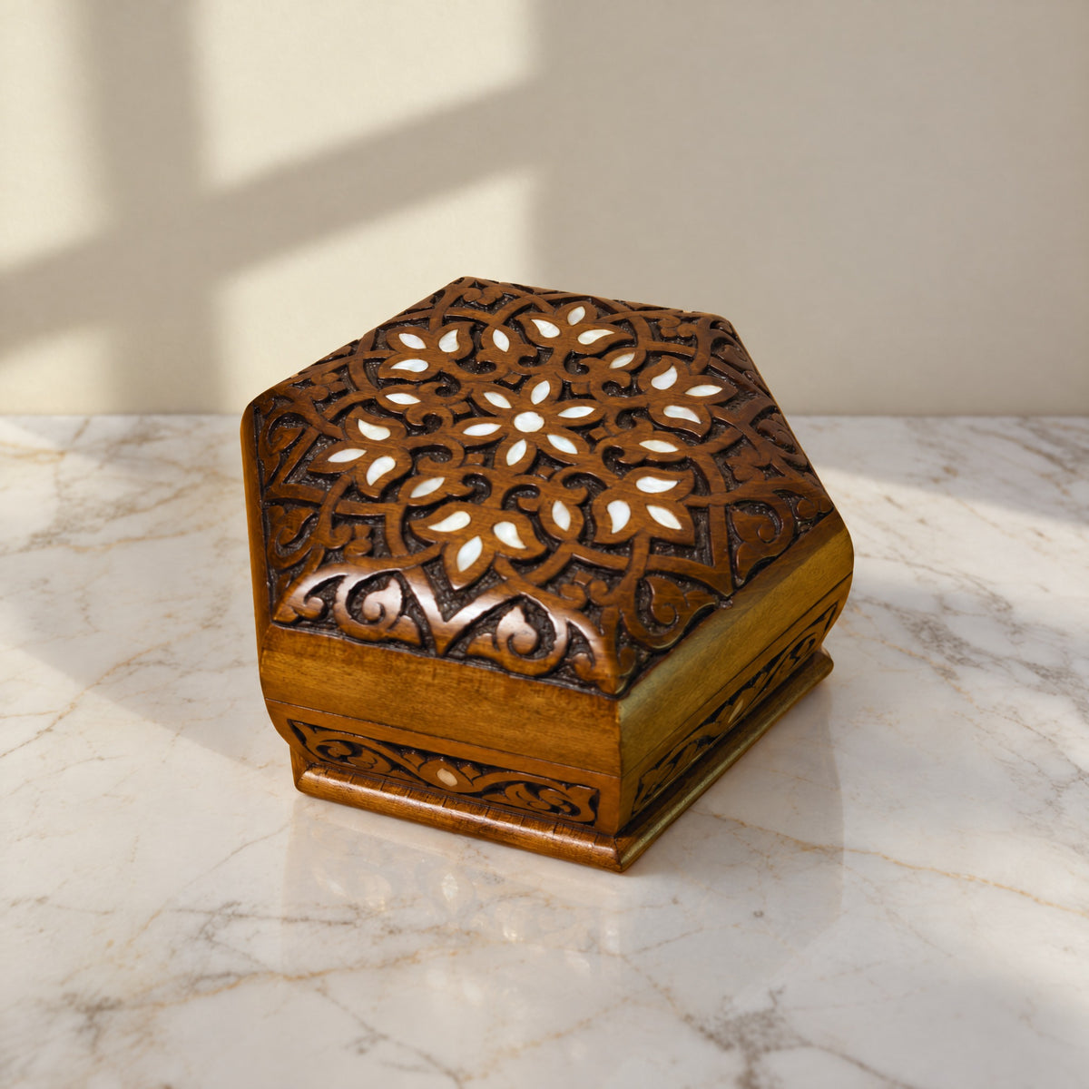 Distinguished Damascene Box on a white marble table in warm window light