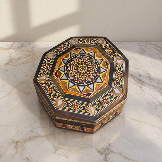 Radiant Mosaic Box on a white marble table in warm window light