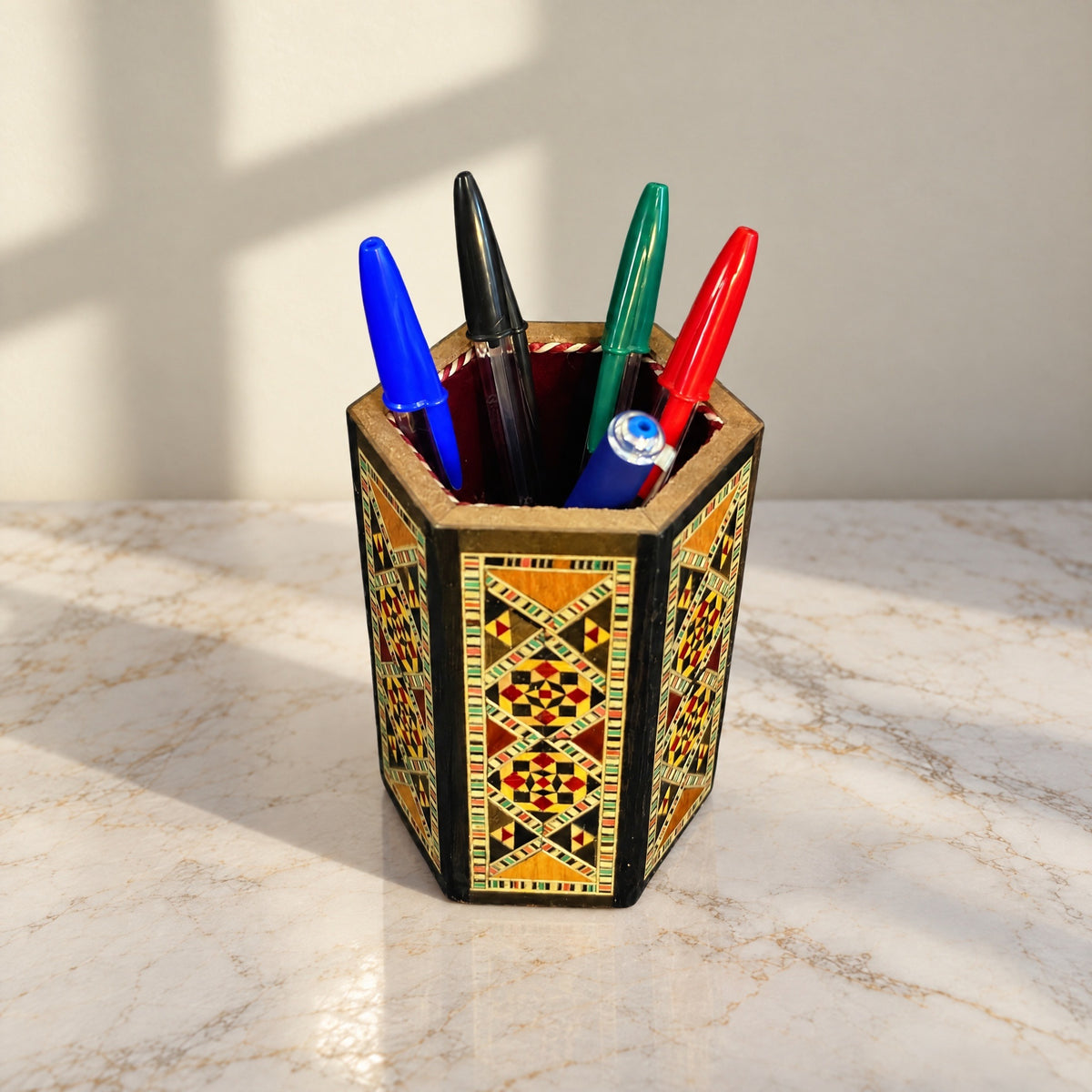Poet's Pen Holder on marble holding four pens