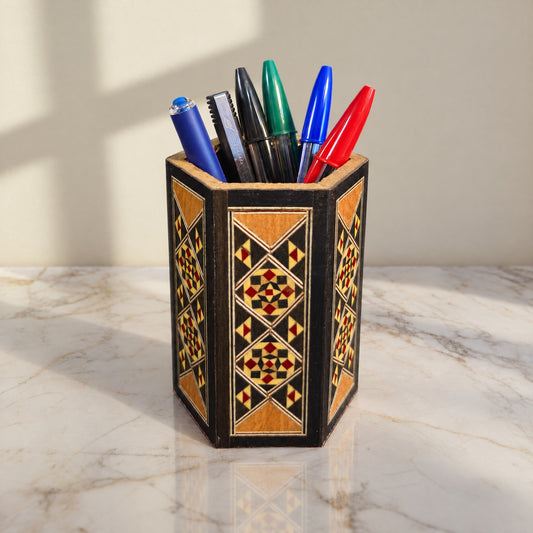 Damascene Pen Holder on a white marble table in warm window light