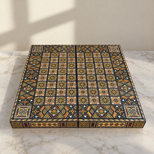 Royal Chess & Backgammon Set on a white marble table in warm window light