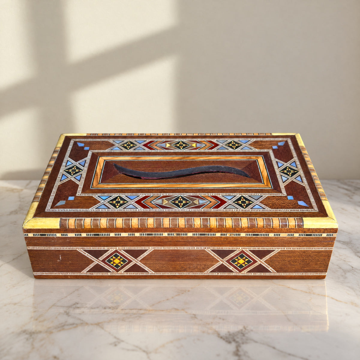 Sahara Mosaic Tissue Box, closed, on marble