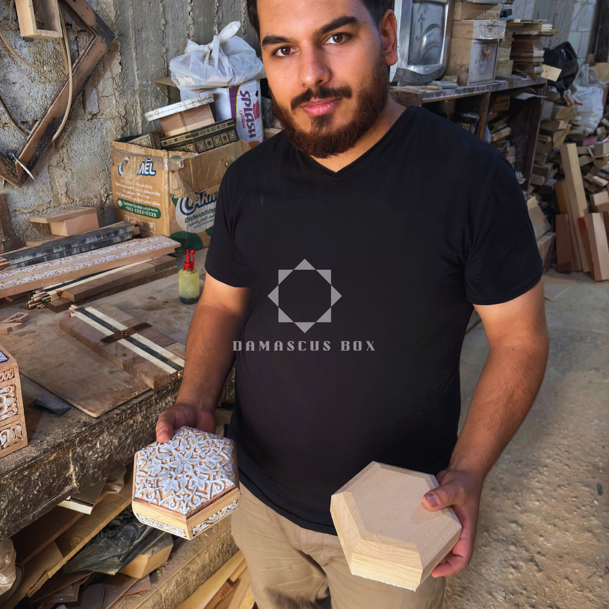 Damascus artisan Mohammad Tarek Aldahh applying mother-of-pearl inlay to a handcrafted piece