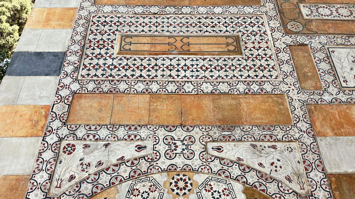 Stone and marble inlay around an arched doorway in Azm Palace, Damascus