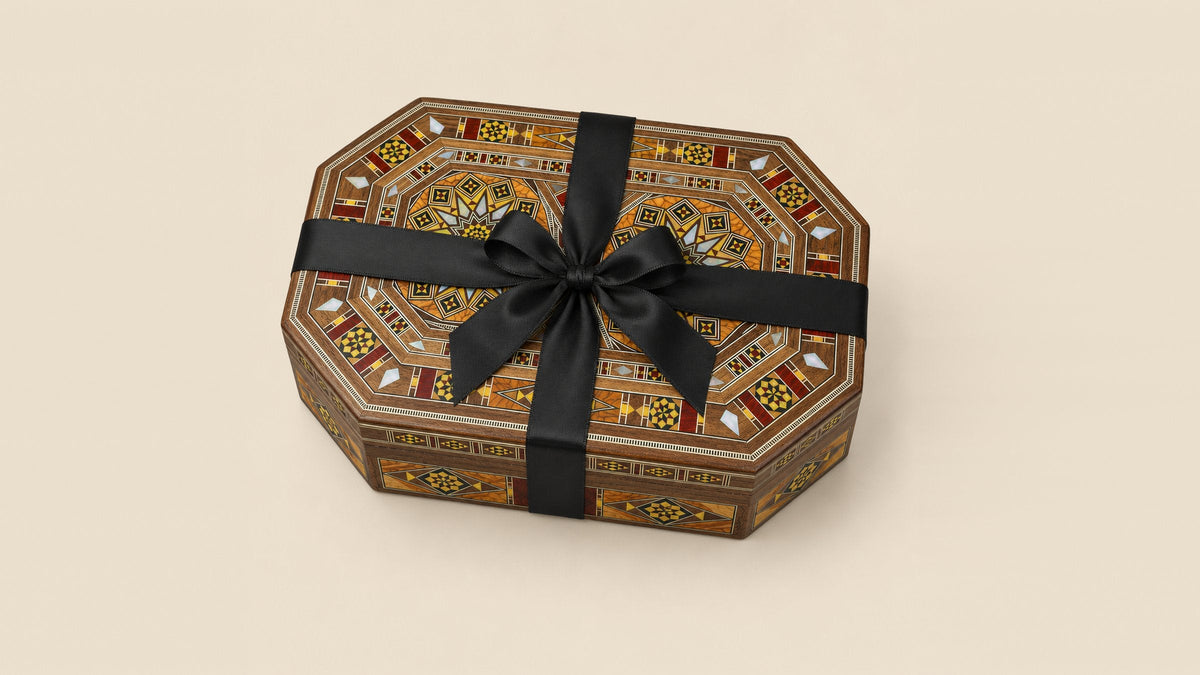 Damascene mosaic box tied with a black ribbon