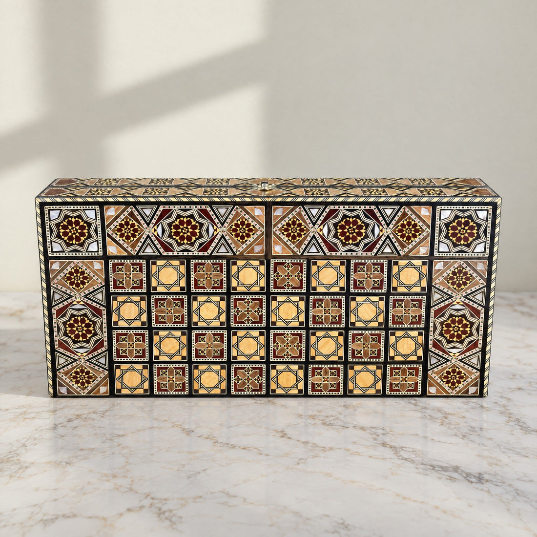 Sultan's Damascene chess and backgammon set, closed case, on marble