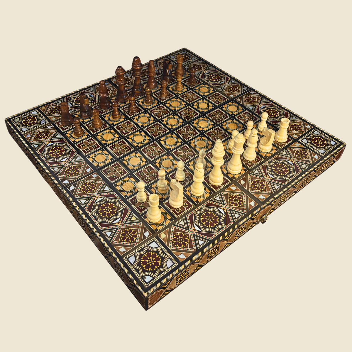 Sultan's Damascene chess and backgammon set, closed, with the chess pieces set up on the board