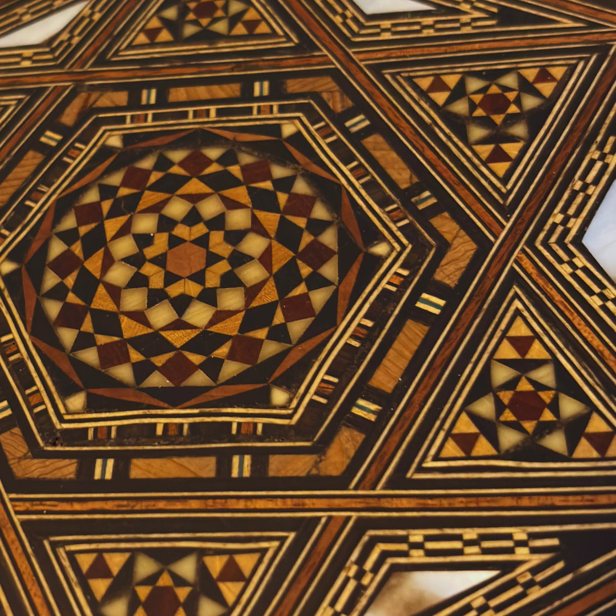 Close-up of the mosaic pattern and mother-of-pearl inlay on the Storied Mosaic Box