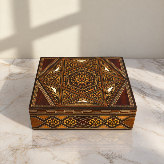 Storied Mosaic Box on a white marble table in warm window light