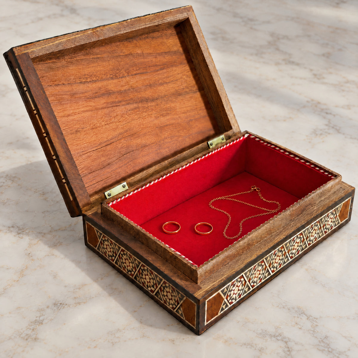 Caravanserai Mosaic Box open on marble, velvet-lined interior with two rings and a chain