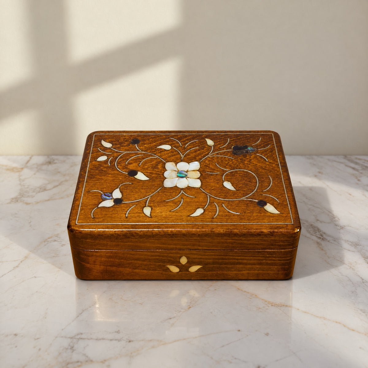 Damascus Arabesque Box on a white marble table in warm window light