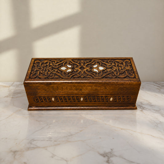 Opulent Damascene Box on a white marble table in warm window light