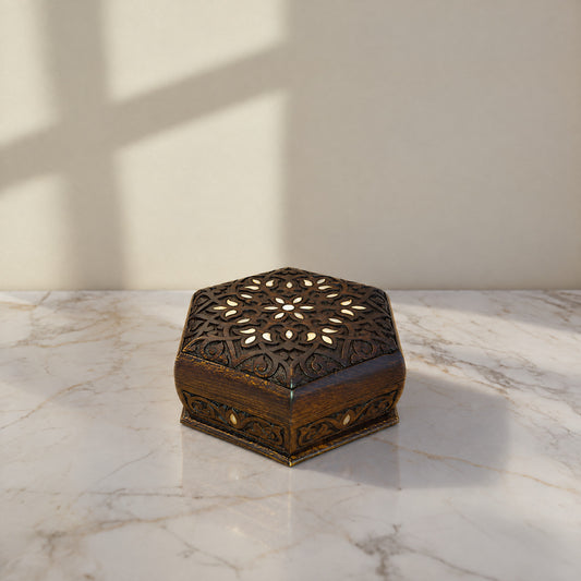 Fine Carved Damascene Box on a white marble table in warm window light