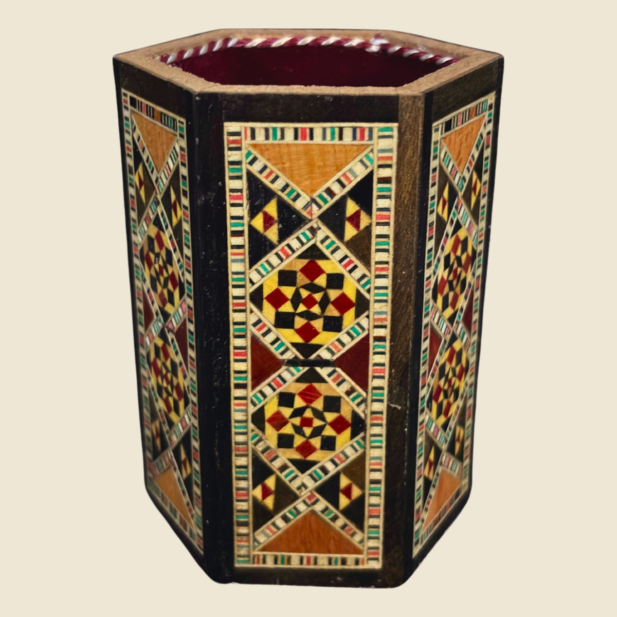 Poet's Pen Holder, front view, with a bold black mosaic design