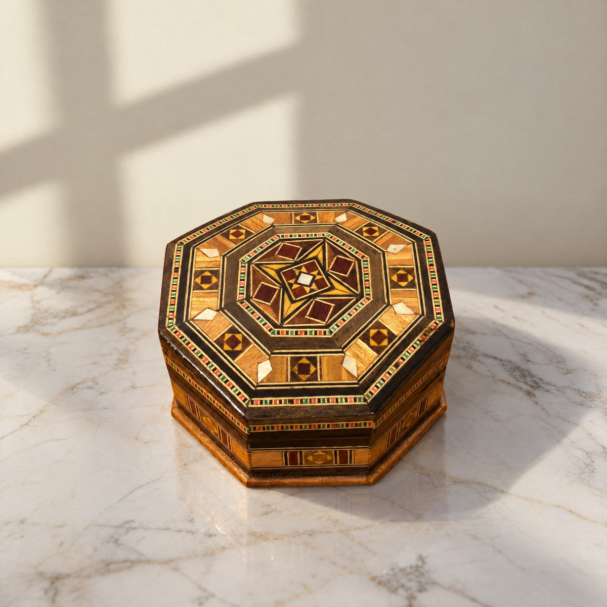 Artisan Mosaic Box on a white marble table in warm window light