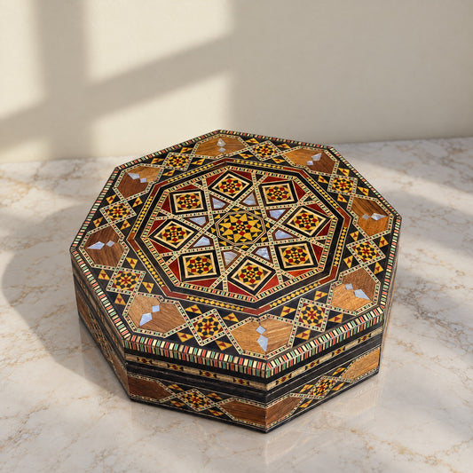 Generations Mosaic Box on a white marble table in warm window light