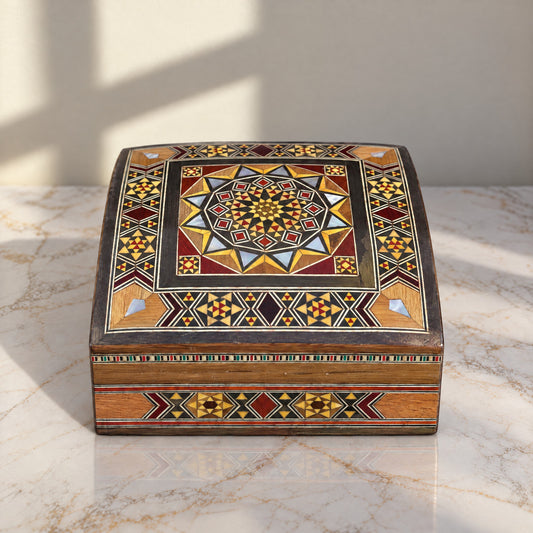 Serene Mosaic Box on a white marble table in warm window light