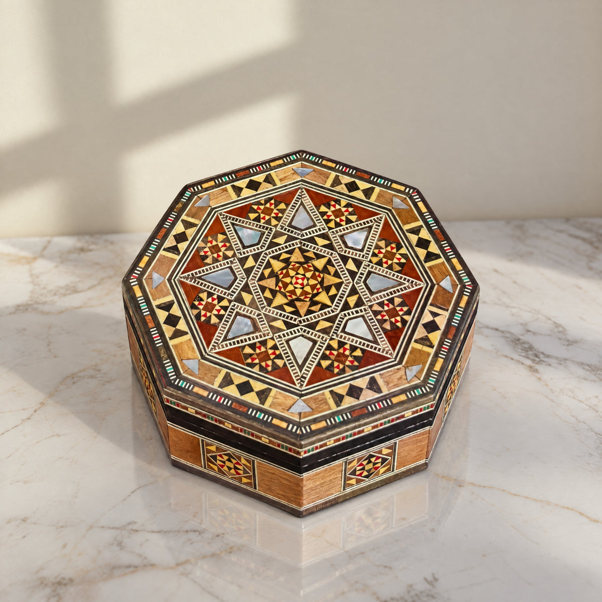 Damascene Trinket Box on a white marble table in warm window light