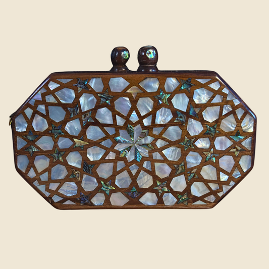 Najmeh Walnut Clutch in solid walnut wood with colored mother-of-pearl inlay, shown from the front