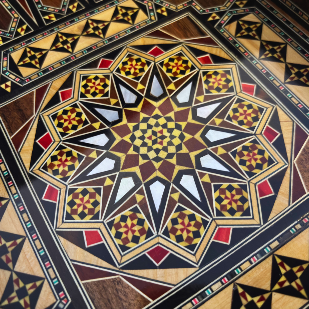 Close-up of the mosaic star and mother-of-pearl inside the backgammon board of the Dynastic Chess & Backgammon Set