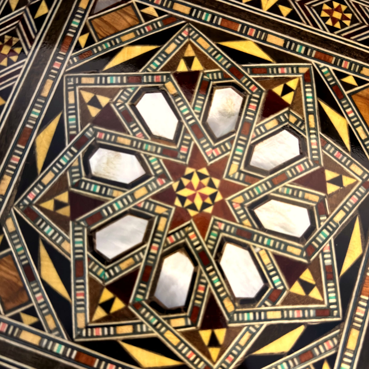Close-up of the mother-of-pearl star inlay on the lid of the Tranquil Mosaic Box