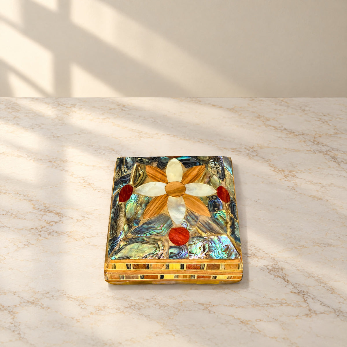 Treasure Mu'ashak box, closed, on marble