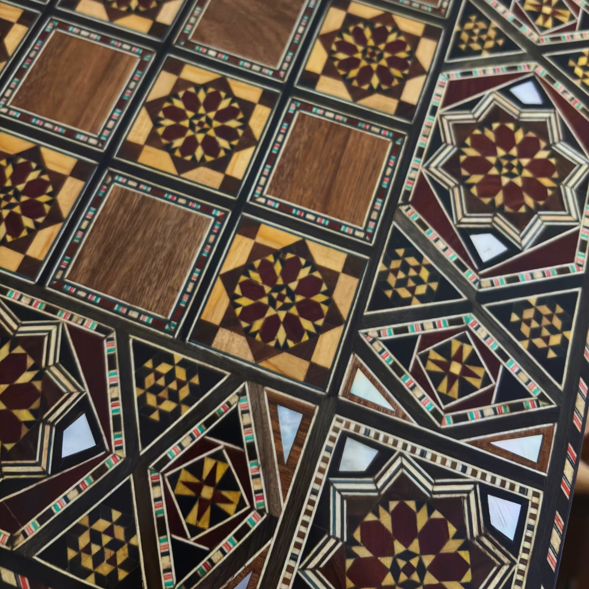 Close-up of the mosaic squares on the chess board side of the Grandmaster's Chess & Backgammon Set