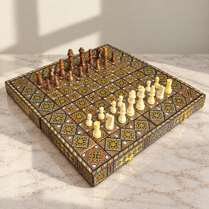 Dynastic Chess & Backgammon Set open on marble, with the chess pieces set up on the board