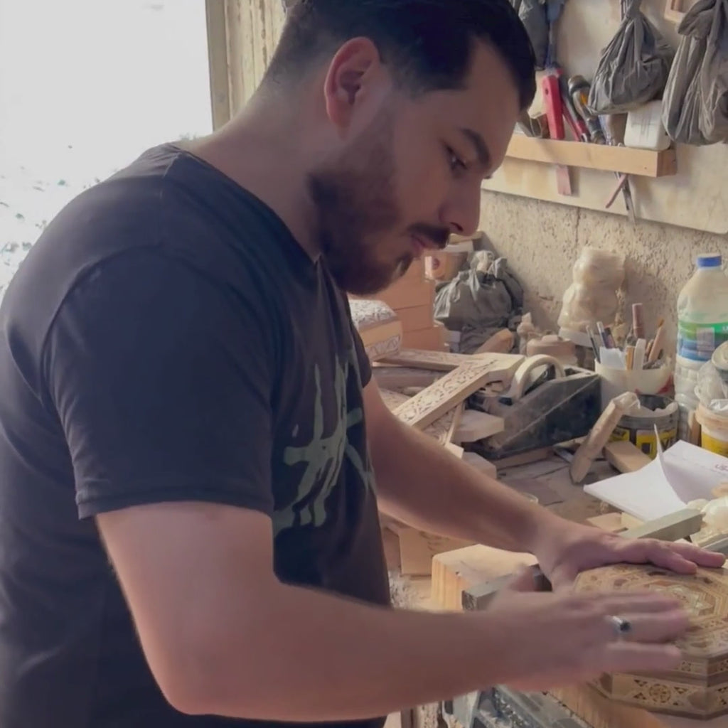 Mohammad Tarek Al-Dahh at work in his workshop in Damascus
