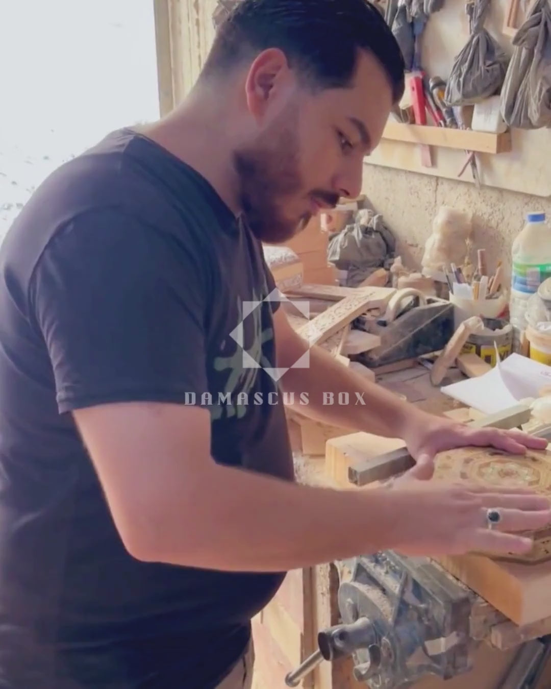Mohammad Tarek Al-Dahh at work in his workshop in Damascus