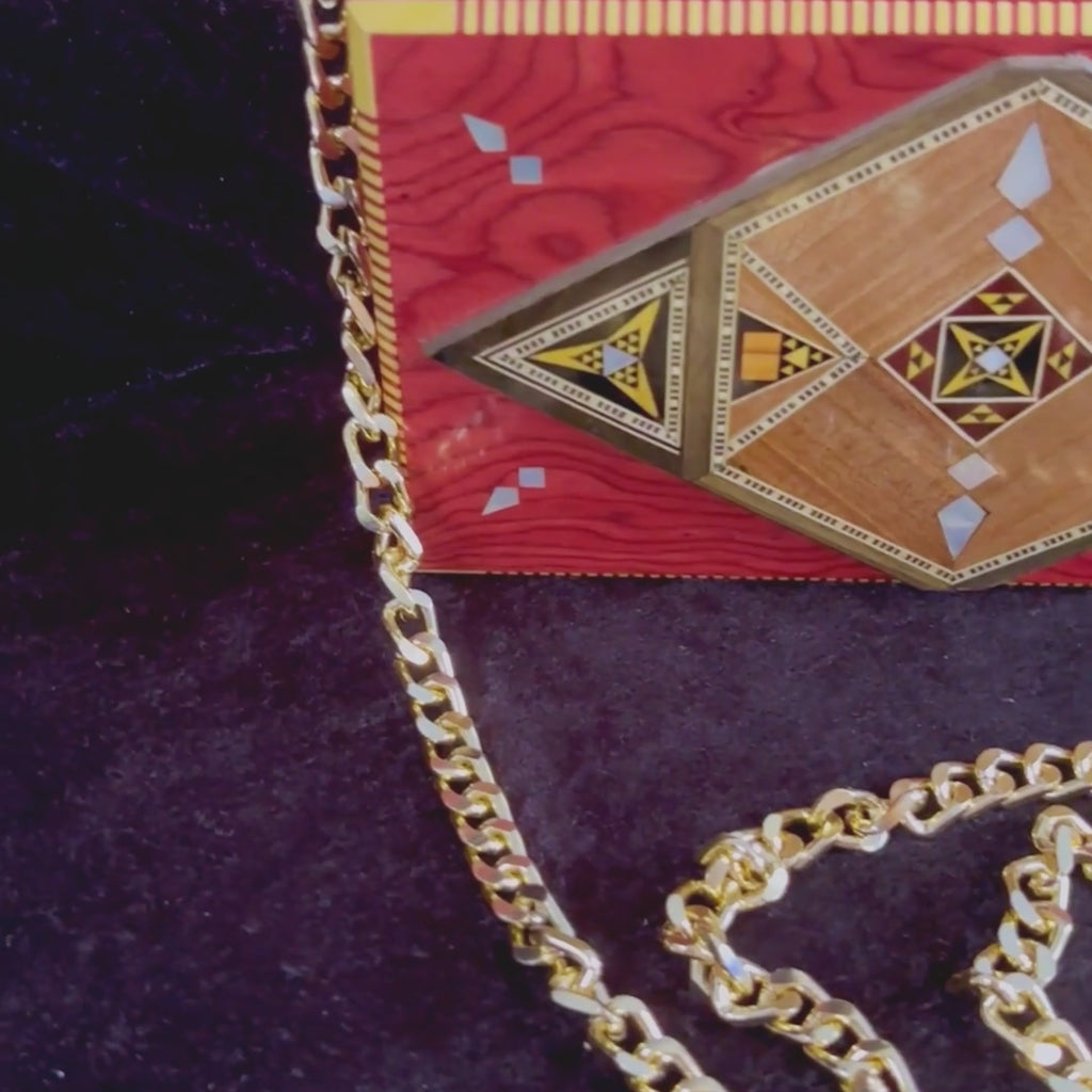 Noor Damascene Clutch video: the clutch, a close-up of the inlay and the open clutch