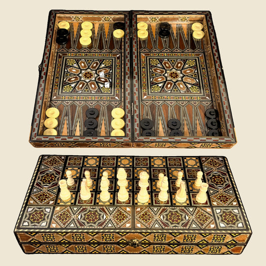 Sultan's Damascene chess and backgammon set, open backgammon board above the closed case with chess pieces