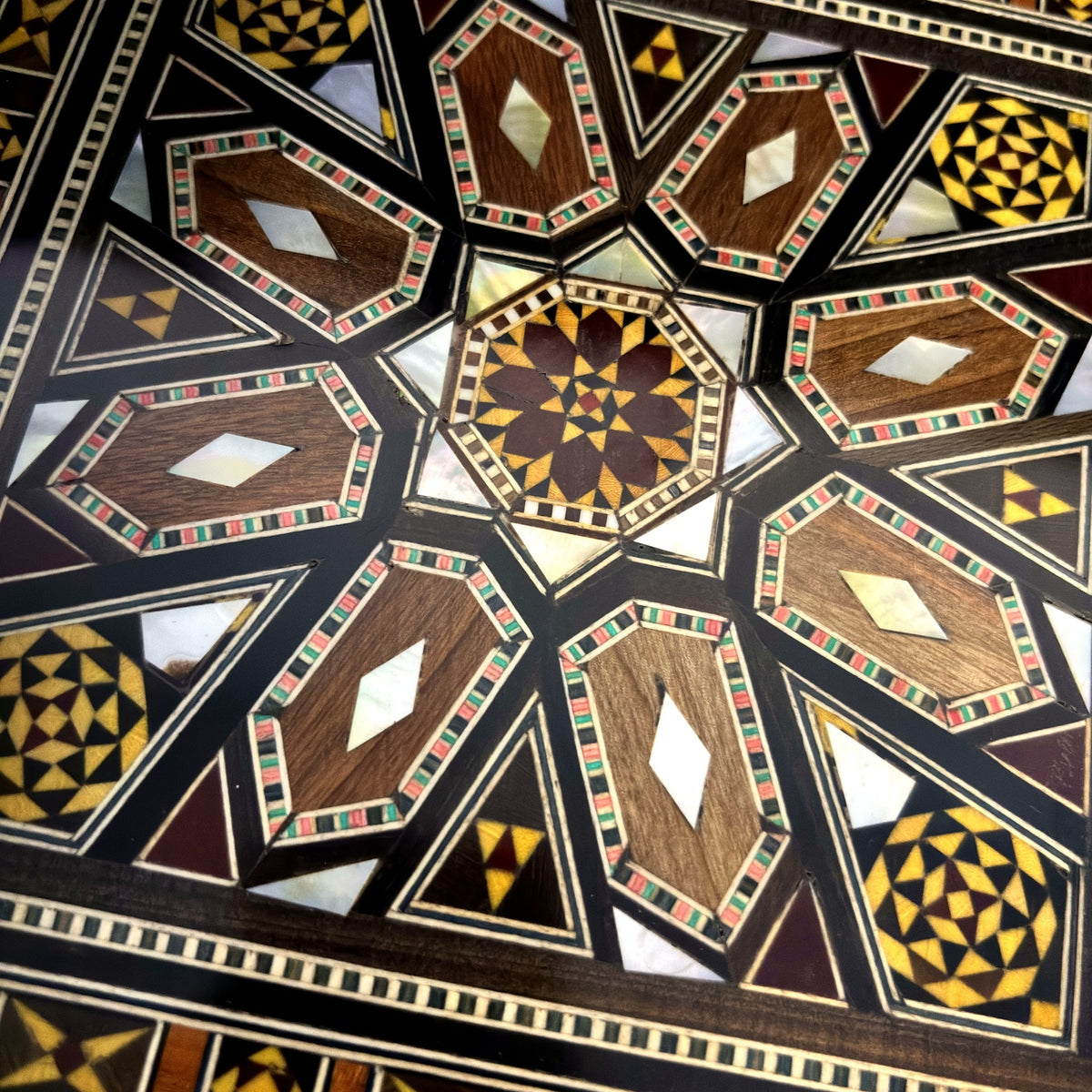 Close-up of the mosaic star and mother-of-pearl inside the Sultan's Damascene backgammon board